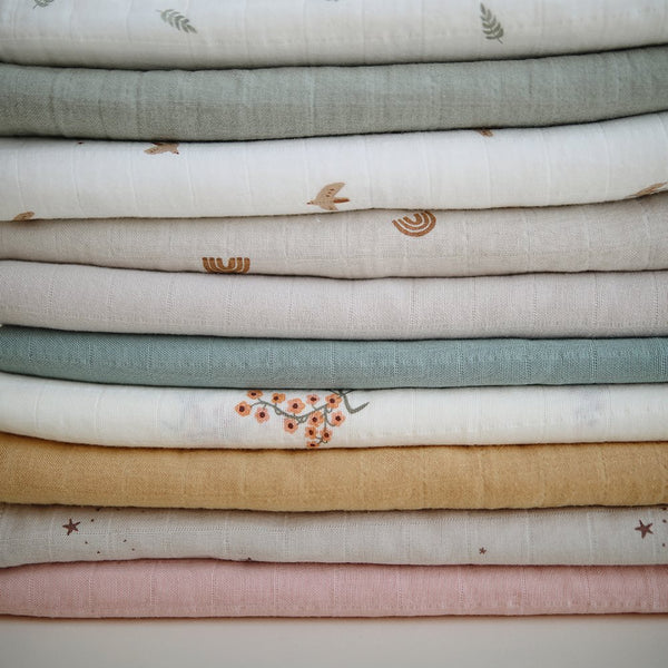 Mushie Muslin Swaddles